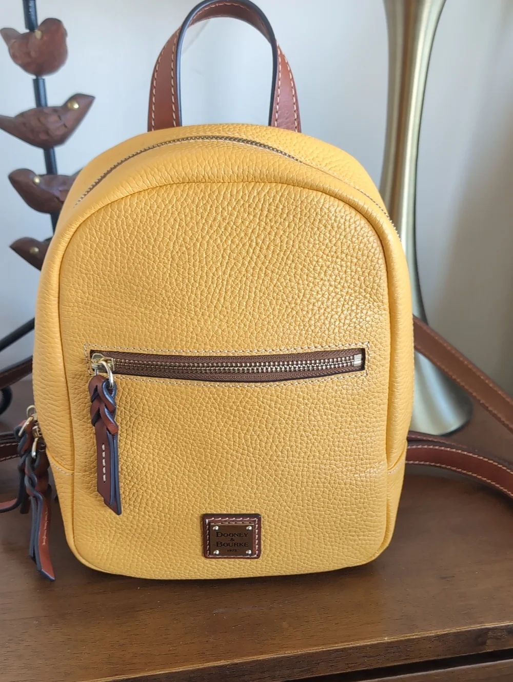Dooney & Bourke Ronnie small pebbled leather back pack in Dandelion yellow🌞